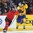MONTREAL, CANADA - JANUARY 4: Canada's Jake Bean #2 bodychecks Sweden's Rasmus Asplund #18 during semifinal round action at the 2017 IIHF World Junior Championship. (Photo by Matt Zambonin/HHOF-IIHF Images)

